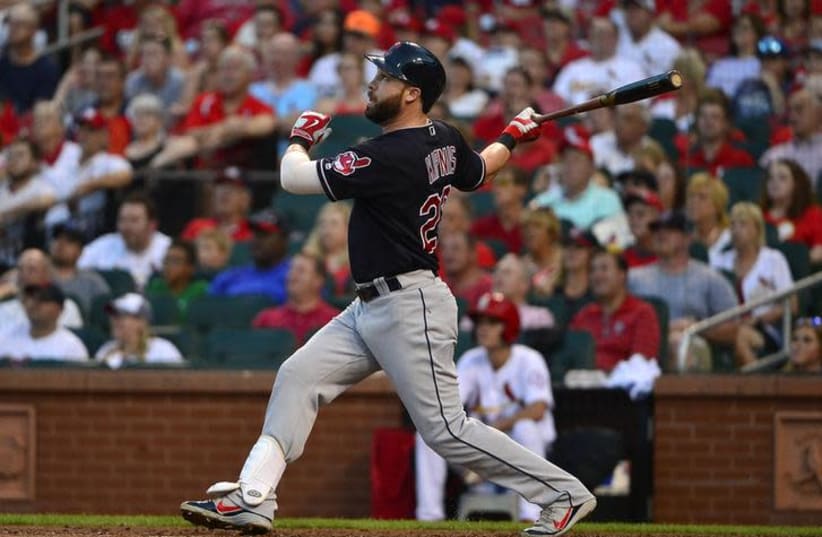 Cleveland Indians second baseman Jason Kipnis (22) hits a one run single off of St. Louis Cardinals starting pitcher Jack Flaherty (not pictured) during the third inning of a baseball game at Busch Stadium (photo credit: JEFF CURRY/USA TODAY SPORTS/HANDOUT VIA REUTERS)