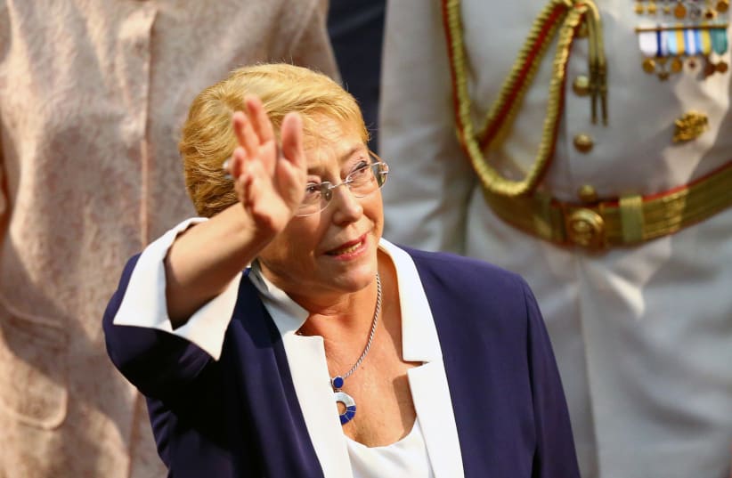 Chile's former President Michelle Bachelet leaves the Congress after the inauguration ceremony of Chile's newly sworn in President Sebastian Pinera in Valparaiso, Chile March 11, 2018. (photo credit: REUTERS/IVAN ALVARADO)