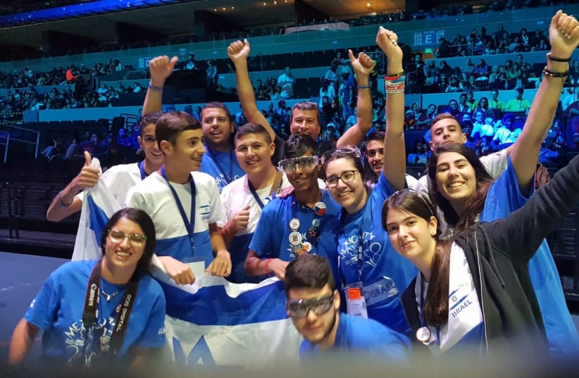 Team Israel celebrates victory in the arena where the challenge took place.  (photo credit: COURTESY OF ITAY TURGEMAN)