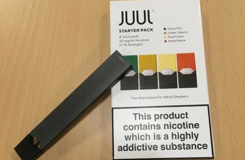 Juul e-cigarette starter pack is seen in this picture illustration taken July 16, 2018 (photo credit: REUTERS)