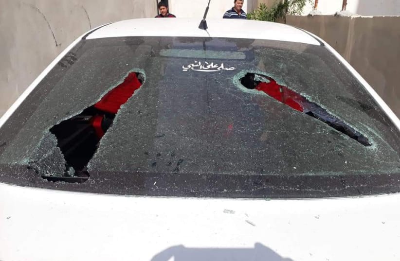 Vandalized car in possible Israeli Price Tag attack in Palestinian Kafr Qalil in the West Bank, August 23, 2018 (photo credit: RABBIS FOR HUMAN RIGHTS‏)