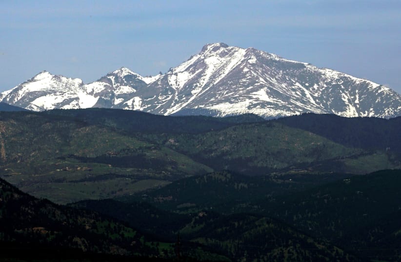 Long's Peak in Rocky Mountain National Park is seen from Boulder, Colorado June 3, 2016 (photo credit: RICK WILKING / REUTERS)