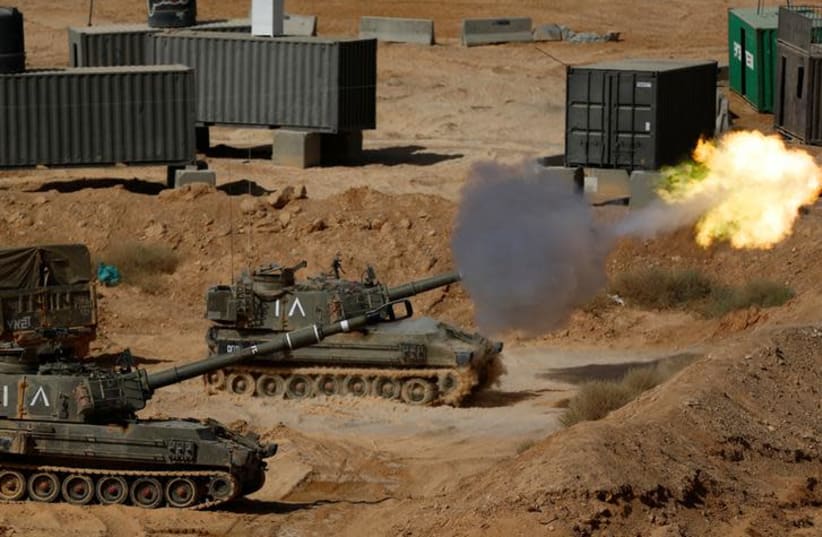 An Israeli mobile artillery unit fires during a combined forces drill in Shizafon military base, near Eilat in southern Israel June 7, 2016 (photo credit: AMIR COHEN/REUTERS)