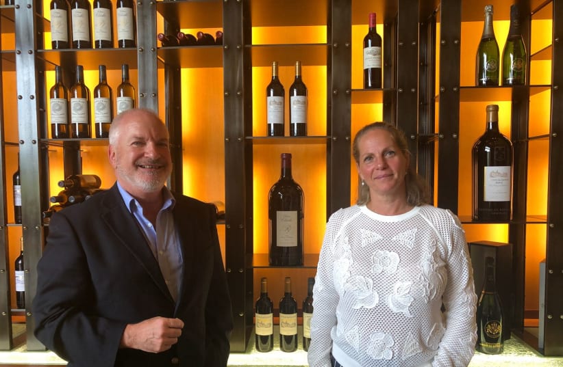 Baroness Ariane de Rothschild and Adam Montefiore standing in front of the EDR Heritage wines (photo credit: Courtesy)
