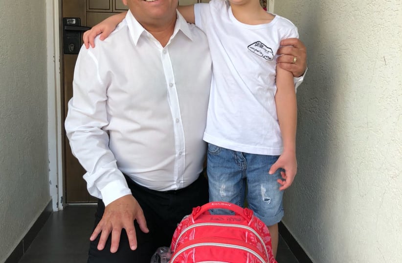 Zionist Union MK Eitan Cabel takes his daughter Shira to school in Rosh Ha'ayin (photo credit: Courtesy)