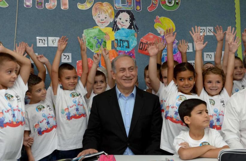 Prime Minister Benjamin Netanyahu at a school in Yad Binyamin (photo credit: Courtesy)