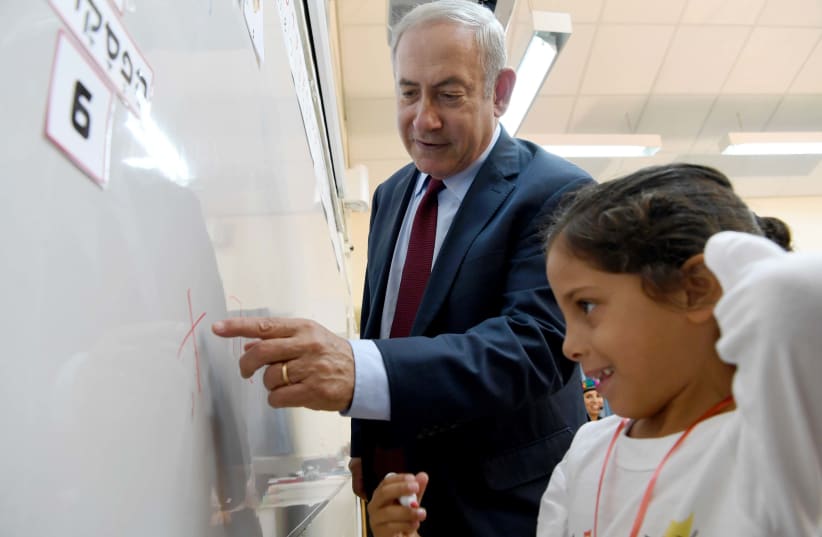 Prime Minister Benjamin Netanyahu starting the school year in the Breuer school in Yad Binyamin (photo credit: AVI OHAYON - GPO)