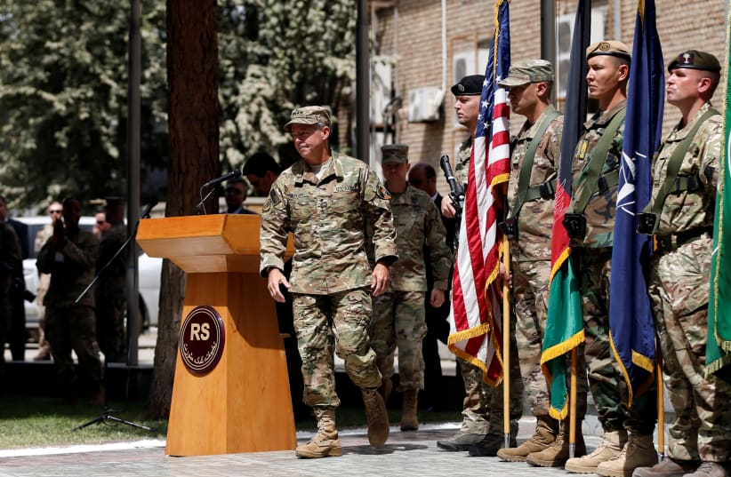 U.S. Army General Scott Miller walks during a change of command ceremony in Resolute Support headquarters in Kabul, Afghanistan September 2, 2018 (photo credit: REUTERS/MOHAMMAD ISMAIL)