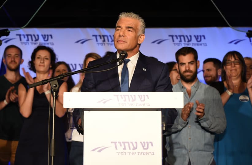 Yesh Atid leader Yair Lapid at a pre-Rosh Hashana toast for his party's activists in Tel Aviv (photo credit: ELAD GUTMAN)