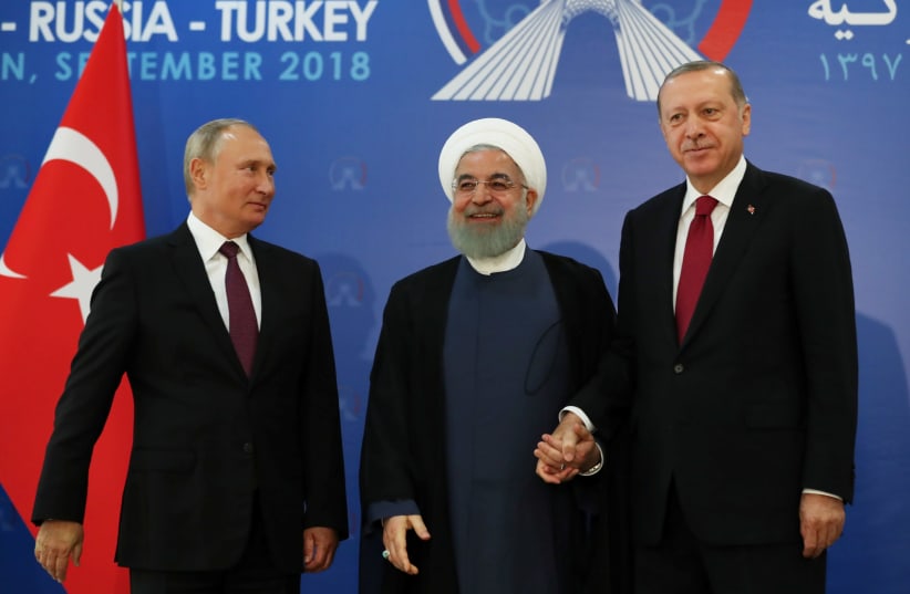 President Vladimir Putin of Russia, Hassan Rouhani of Iran and Tayyip Erdogan of Turkey meet in Tehran, Iran September 7, 2018. (photo credit: REUTERS)