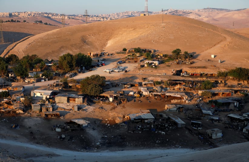 A general view shows the main part of the Palestinian Bedouin encampment of Khan al-Ahmar village that Israel plans to demolish, in the occupied West Bank (September 11, 2018).  (photo credit: REUTERS/MOHAMAD TOROKMAN)