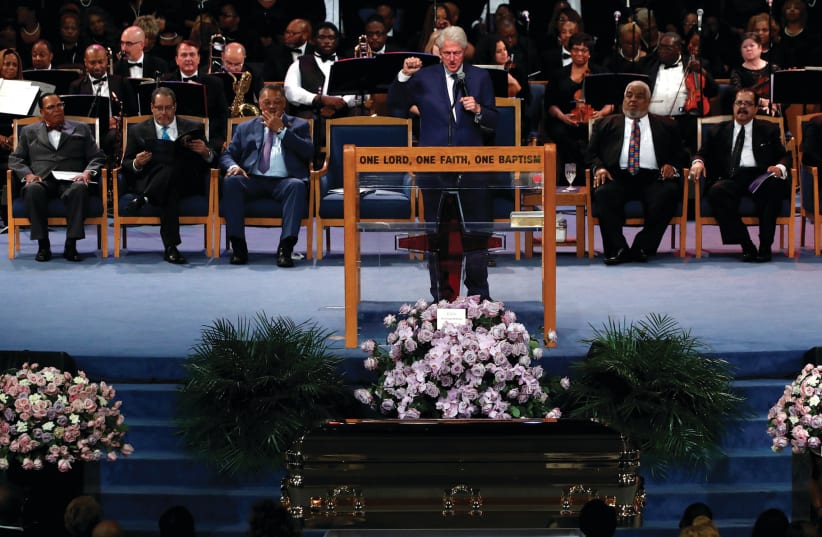 WHY WAS Bill Clinton on the same stage of Louis Farrakhan. (photo credit: REUTERS)