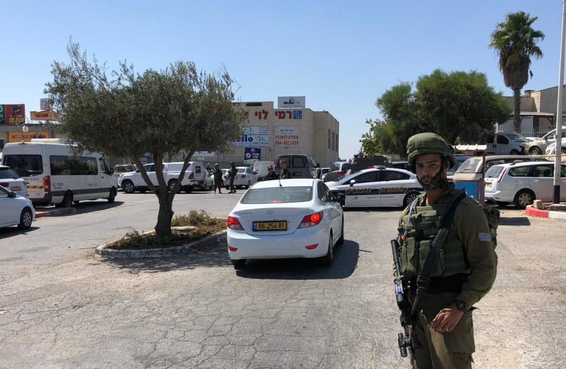  The scene of the fatal stabbing attack at the Gush Etzion Junction on September 16, 2018. (photo credit: AMICHAI GABBAI/TPS)