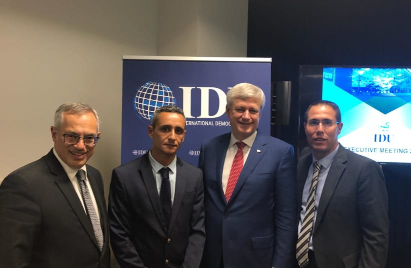 From Left: Canadian MP Tony Clement, Likud director-general Tzuri Sisso, IDU chairman and former Canadian prime minister Stephen Harper, and Likud foreign affairs director Eli Hazan (photo credit: Courtesy)