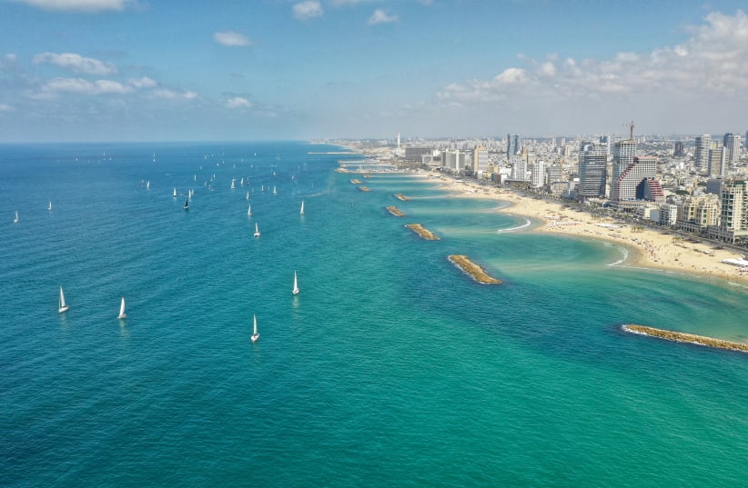 The traditional sail-by of the Sail Tel Aviv - Yaffo watersports festival which aims to promote marine activities along the 14km shoreline of the city, September 22, 2018 (photo credit: DORON SAHAR)