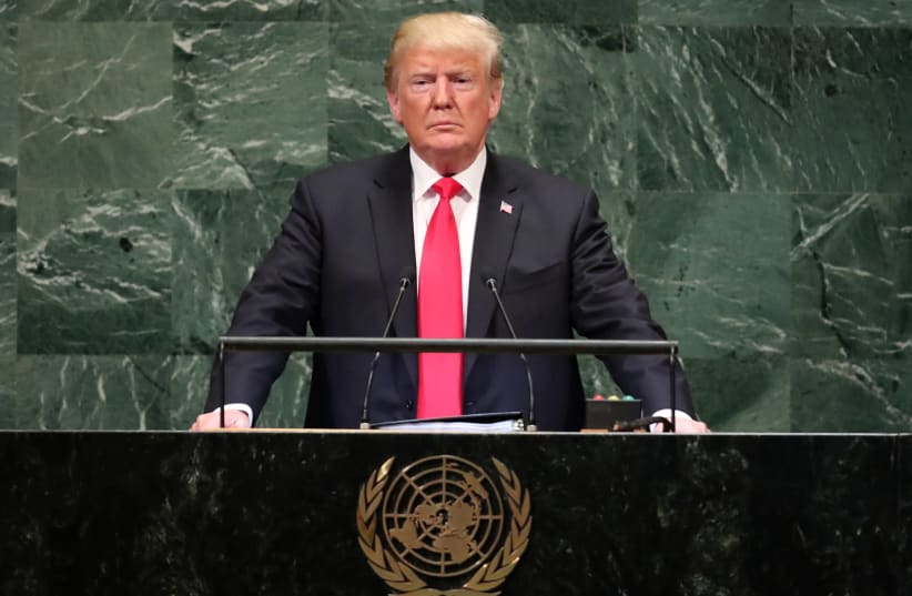 US President Donald Trump pauses as he addresses the 73rd session of the United Nations General Assembly at UN headquarters in New York, September 25, 2018 (photo credit: CARLO ALLEGRI/REUTERS)