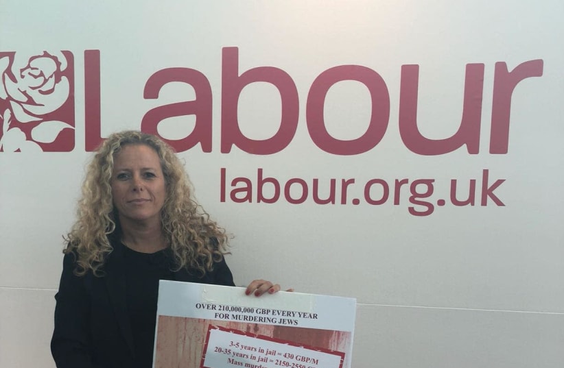 Zionist Union MK Ayelet Nachmias-Verbin at the UK Labour Party Conference with a poster on Palestinian Authority monetary payments to convicted terrorists (photo credit: IVRY VERBIN)