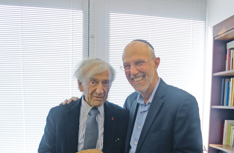 Jonathan Porath (R) and Elie Wiesel (L) (photo credit: Courtesy)
