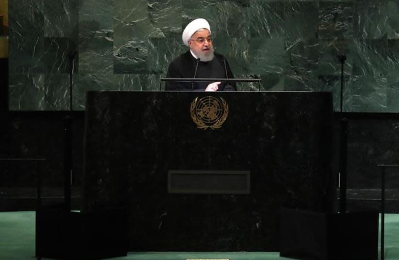 Iran's President Hassan Rouhani addresses the 73rd session of the United Nations General Assembly at U.N. headquarters in New York (photo credit: CARLO ALLEGRI/REUTERS)