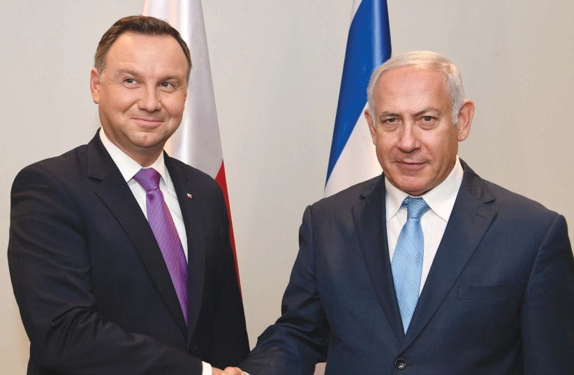 Polish President Andrzej Duda and Prime Minister Benjamin Netanyahu meet in New York on September 26, 2018. (photo credit: AVI OHAYON - GPO)
