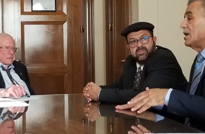 MKs Yusef Jabarin (left) and Jamal Zahalka meet with Senator Bernie Sanders (photo credit: COURTESY JOINT LIST)