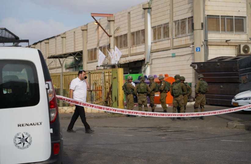 IDF and Magen David Adom at the sceneof the terror shooting in the Barkan industrial Zone (photo credit: HALLEL MEIR/TPS)