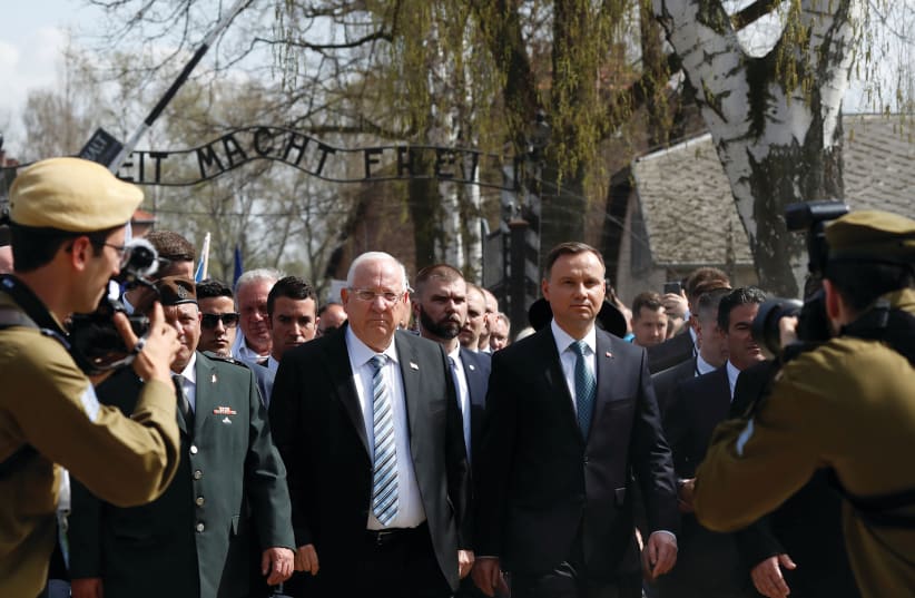 PRESIDENT REUVEN Rivlin and Polish President Andrzej Duda take part in the annual ‘March of the Living’ at Auschwitz in April.  (photo credit: KACPER PEMPEL / REUTERS)