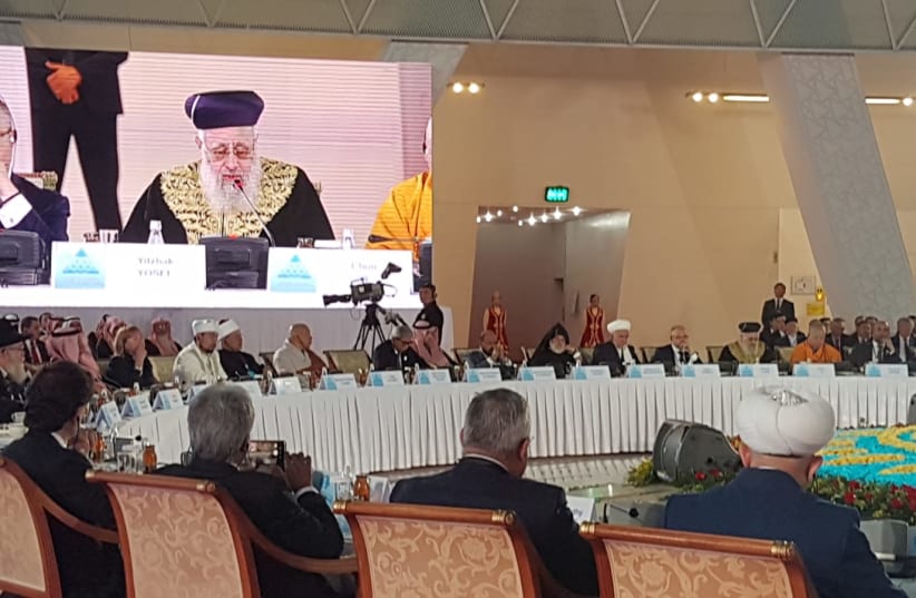 Rabbi Yosef Yitzhak addresses a panel of world religious leaders in Astana, Kazakhstan. (photo credit: CHIEF RABBINATE)