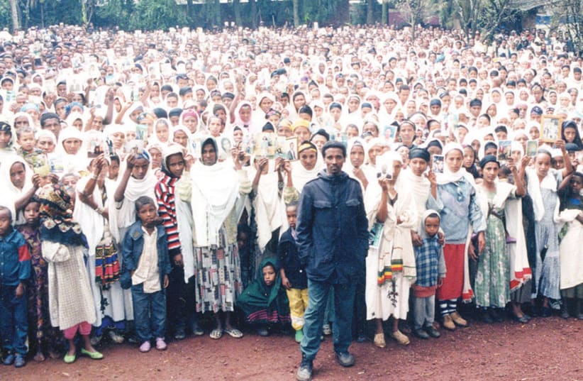 The author (front right) with 8,000 Falash Mura in 1998 ignored at the time by the State of Israel; although all of them made aliyah, about 9,000 remain in Gondar today (photo credit: YOSEF ABRAMOWITZ)