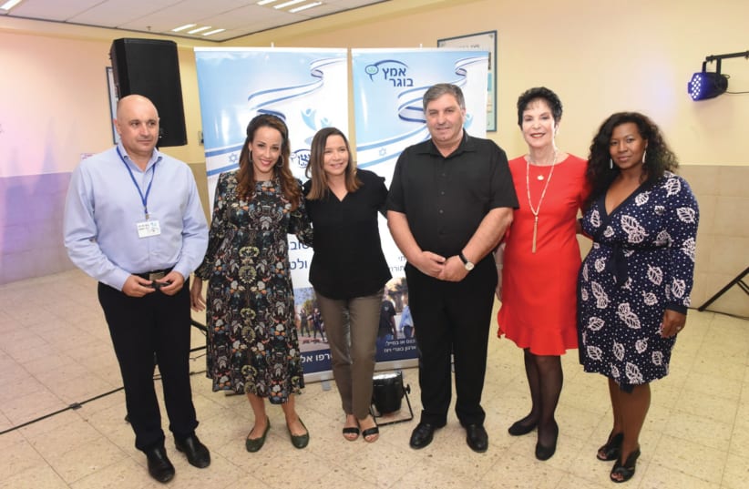 LEFT TO RIGHT: Brig.-Gen. (res.) David Suissa, former chief artillery officer and chairman of the WIZO Graduate Association; Eden Harel, MC; MK Shelly Yacimovich; Danny Atar, KKL-JNF chairman; Prof. Rivka Lazovsky, World WIZO chairperson; Oshra Yosef Friedman, chairwoman of the Authority for the Adv (photo credit: KFIR SIVAN)