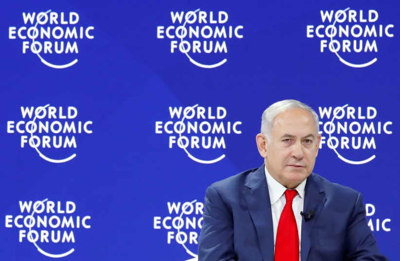 Israel's Prime Minister Benjamin Netanyahu attends the World Economic Forum (WEF) annual meeting in Davos, Switzerland January 25, 2018.  (photo credit: REUTERS/DENIS BALIBOUSE)