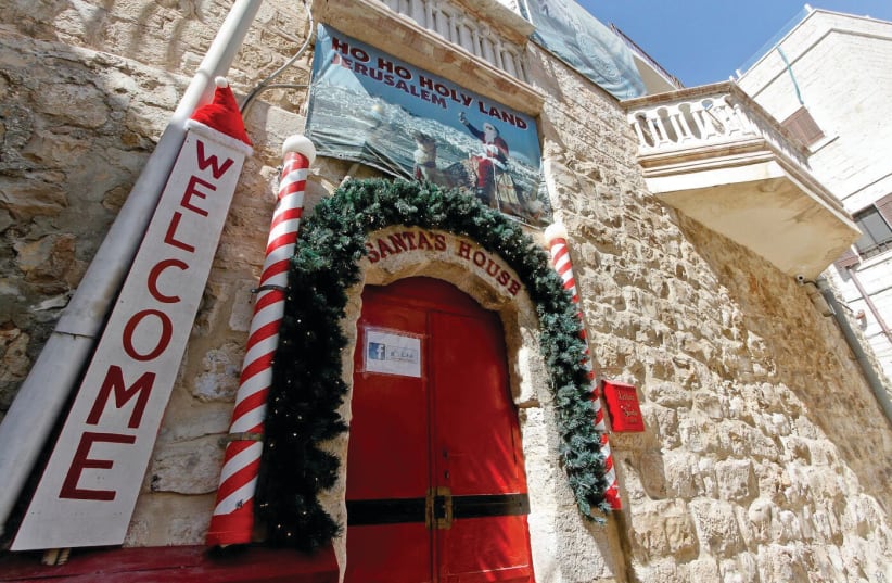 SANTA’S HOUSE in the Christian Quarter of the Old City opens its doors (photo credit: GUY YITZHAKI)