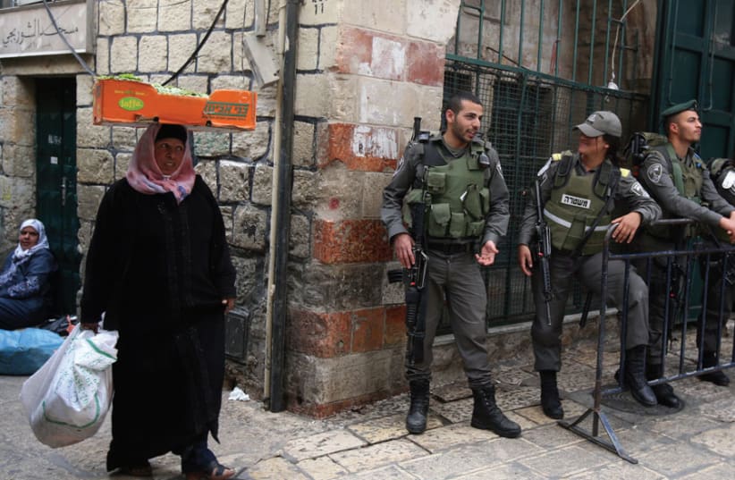 BORDER POLICE patrol Jerusalem’s Old City. (photo credit: MARC ISRAEL SELLEM)