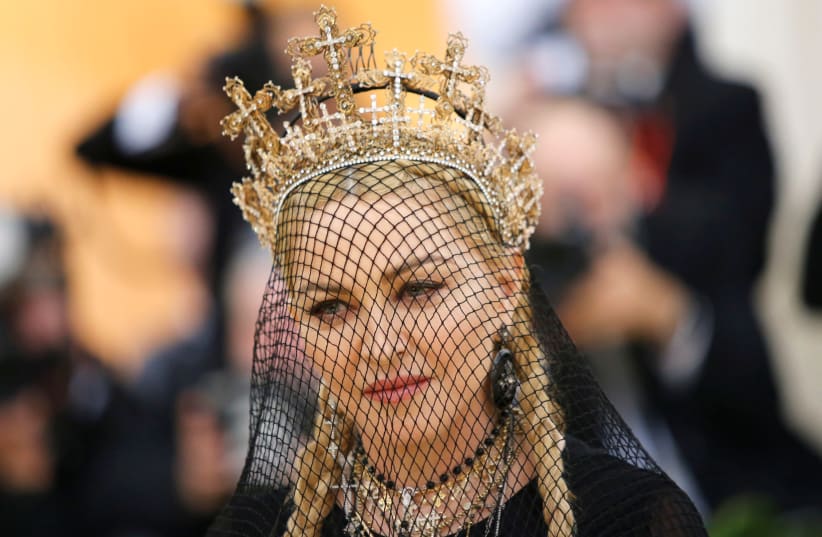 Madonna arrives at the Metropolitan Museum of Art Costume Institute Gala (Met Gala) to celebrate the opening of “Heavenly Bodies: Fashion and the Catholic Imagination” in the Manhattan borough of New York, U.S., May 7, 2018 (photo credit: REUTERS/EDUARDO MUNOZ)