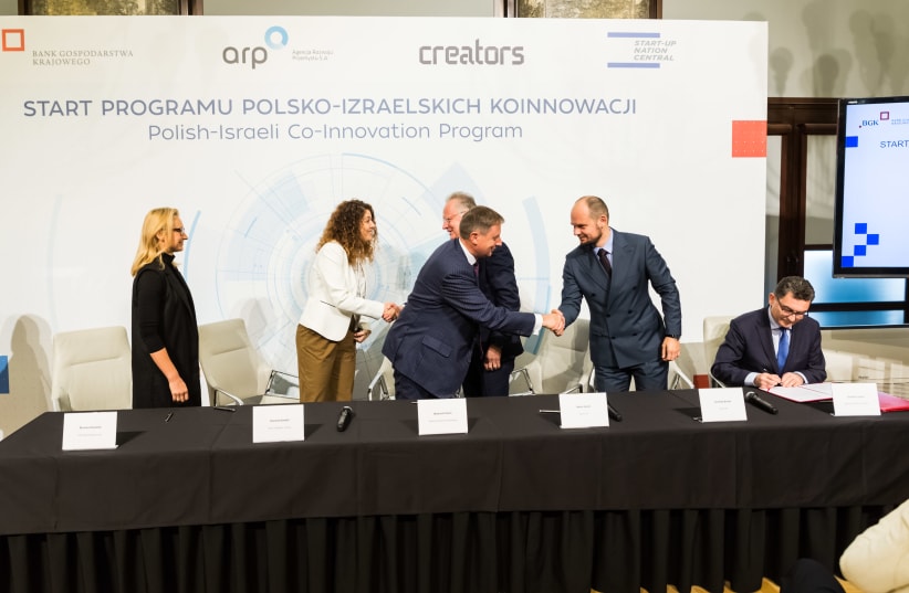 Signing ceremony at the launch of the Polish-Israeli Co-Innovation Program in Warsaw, October 24, 2018 (photo credit: BANK GOSPODARSTWA KRAJOWEGO)