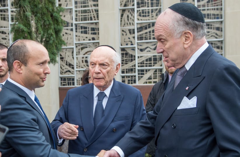 Diaspora Affairs Minister Naftali Bennett greets World Jewish Congress President Ronald Lauder in Pittsburgh on Monday (photo credit: ALEXI ROSENFELD)