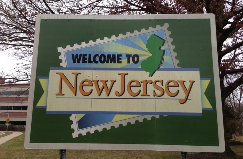 A 'Welcome to New Jersey' sign (photo credit: FAMARTIN/WIKIMEDIA COMMONS)