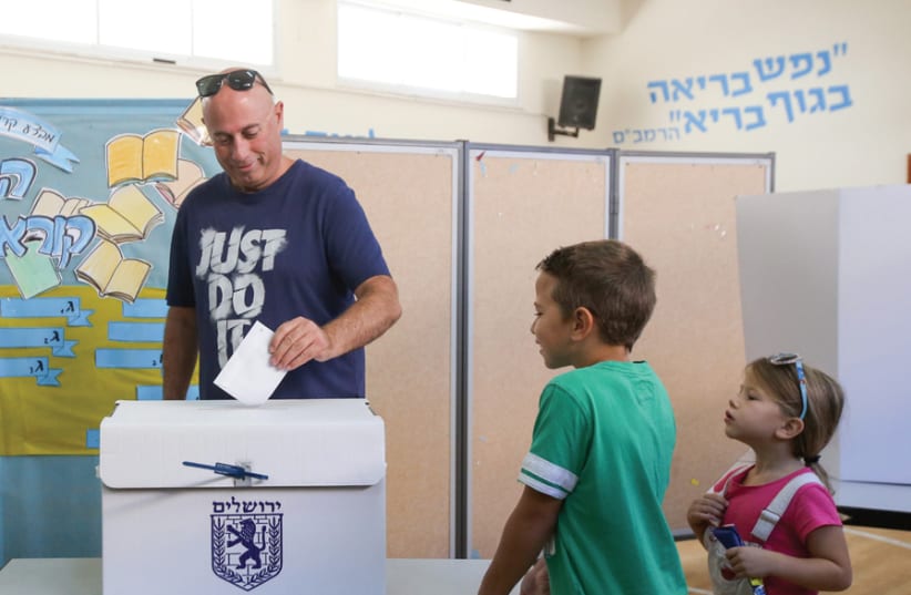 At the end of the 15 hours that polling stations were open, only 222,000 Jerusalem residents bothered to cast ballots – merely a third of the 636,000 eligible – including in the Arab sector qualified to vote. (photo credit: MARC ISRAEL SELLEM)