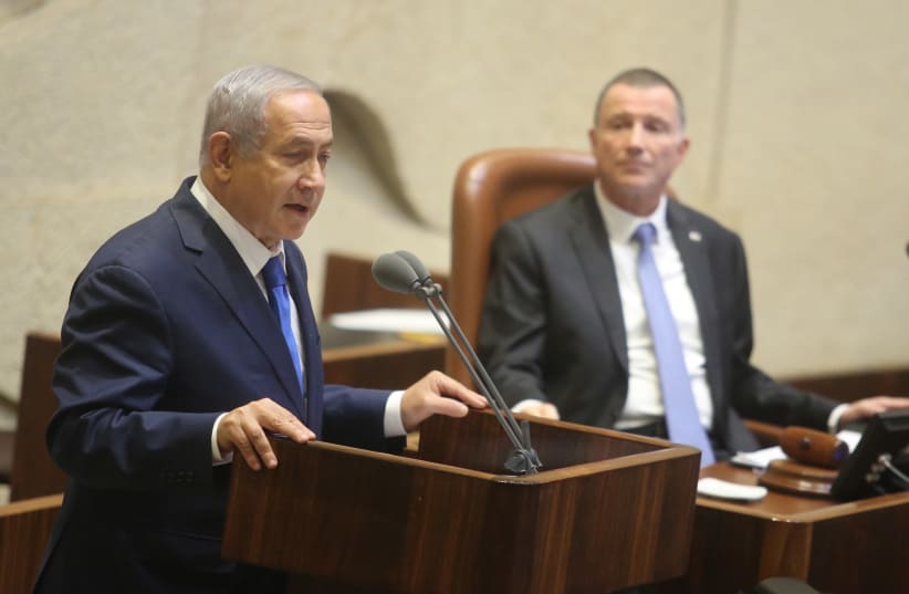 Prime Minister Benjamin Netanyahu [L] speaking in Knesset next to Speaker of the Knesset Yuli Edelstein [R].    (photo credit: MARC ISRAEL SELLEM)