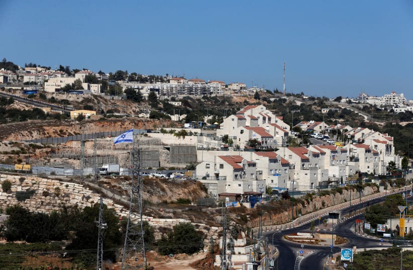 A general view shows the Jewish settlement of Kiryat Arba in Hebron, in the West Bank September 11, 2018. Picture taken September 11, 2018 (photo credit: MUSSA QAWASMA / REUTERS)