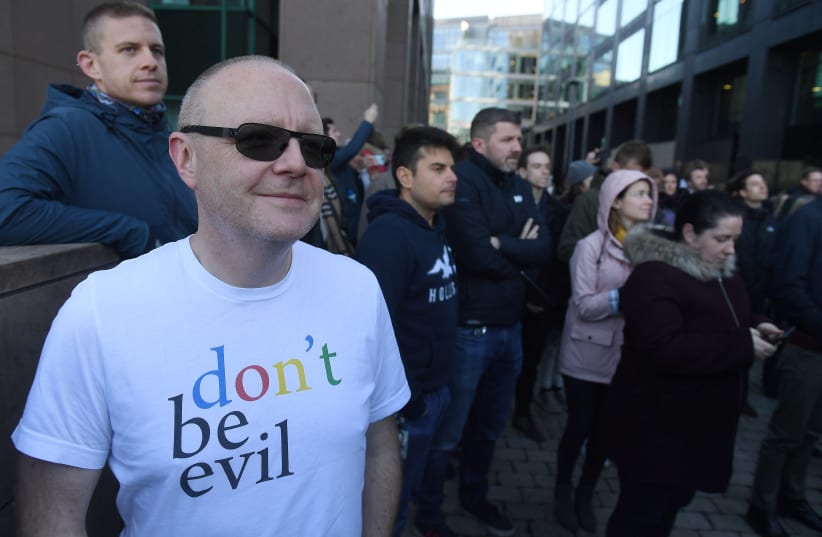 Workers stand outside Google's European headquarters after walking out as part of a global protest over workplace issues, in Dublin, Ireland (photo credit: REUTERS/CLODAGH KILCOYNE)