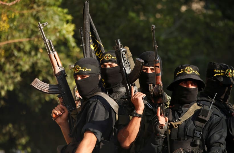 Palestinian Islamic Jihad militants participate in a military show in Gaza City (photo credit: MOHAMMED SALEM/ REUTERS)