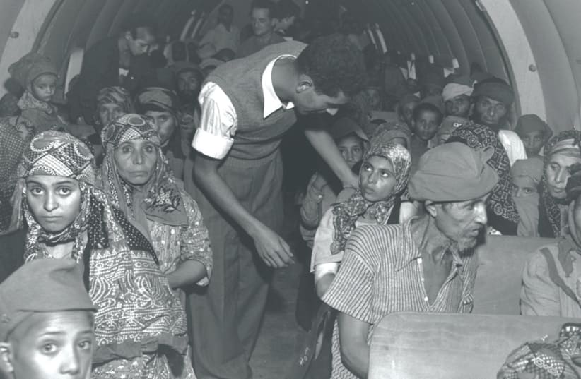 Yemenite immigrants on a plane flying to Lod Airport from Aden on October 23, 1949 (photo credit: TEDDY BRAUNER/GPO)