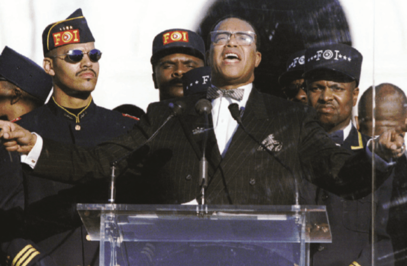 NATION OF ISLAM leader Louis Farrakhan addresses of marchers at the Mall in Washington, DC, during the ‘Million Man March’ in 1995 (photo credit: MIKE THEILER/REUTERS)