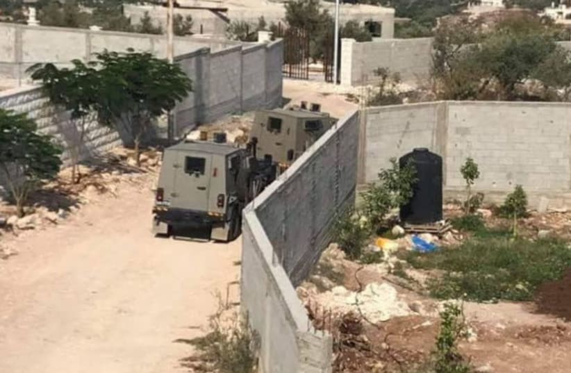 IDF Forces surround house of Ashraf Walid Suleiman Na’alwa (photo credit: PALESTINIAN MEDIA)