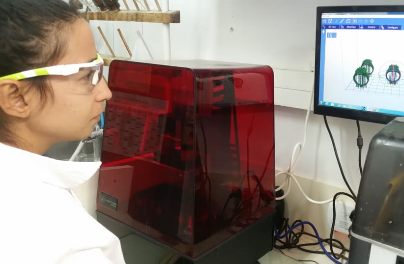 Researchers at Hebrew University's 3D and Functional Printing Center (photo credit: Courtesy)