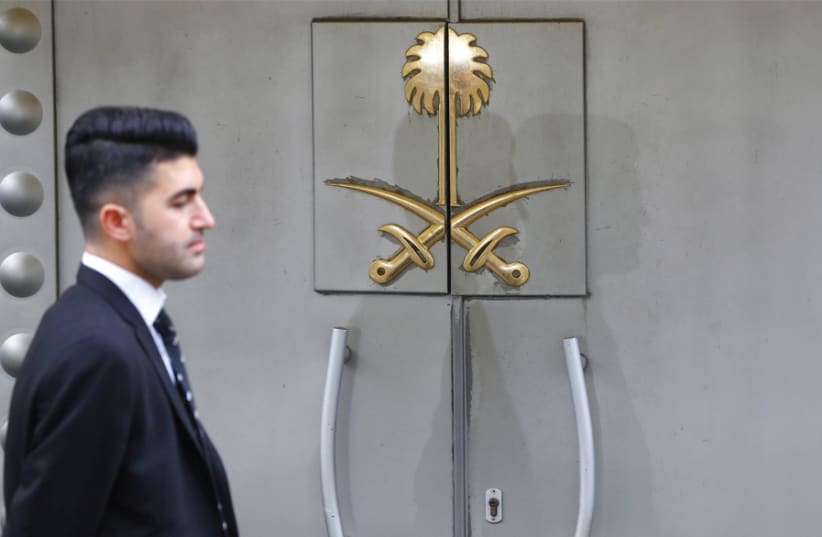A SECURITY staff member stands at the entrance of Saudi Arabia’s consulate in Istanbul on October 31. (photo credit: REUTERS)