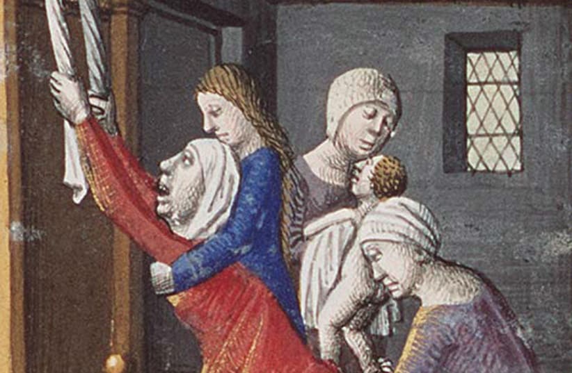 BIRTH OF Esau and Jacob as an example of twins’ fate against the arguments of astrology, by François Maitre, 1475-1480, detail from miniature at the Museum Meermanno Westreenianum, The Hague. (photo credit: Wikimedia Commons)
