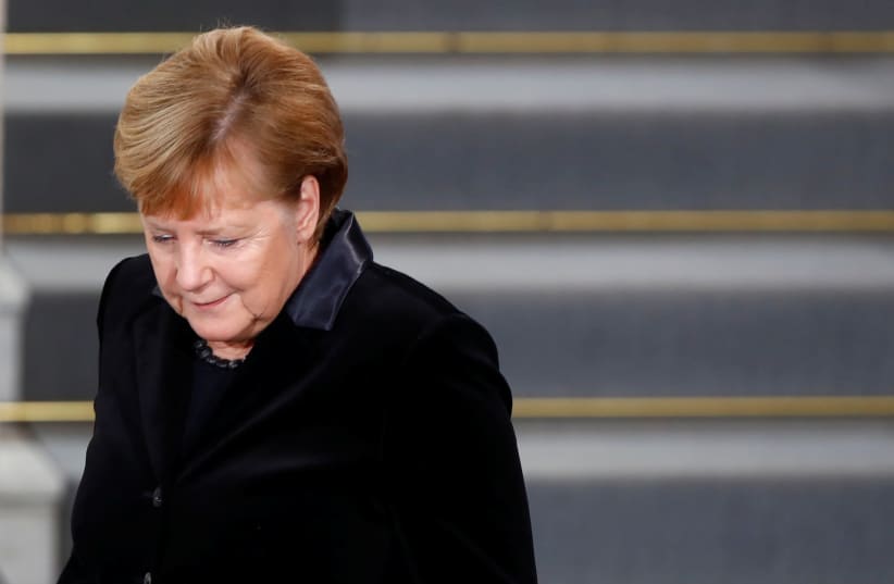 German Chancellor Angela Merkel is pictured after speaking during a ceremony to mark the 80th anniversary of Kristallnacht, also known as Night of Broken Glass, at Rykestrasse Synagogue, in Berlin, Germany, November 9, 2018 (photo credit: AXEL SCHMIDT/REUTERS)