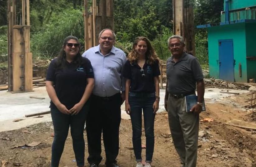 Consul to NY Dani Dayan visits an IsraAID site earlier this year (photo credit: ISRAEL CONSULATE IN NEW YORK)